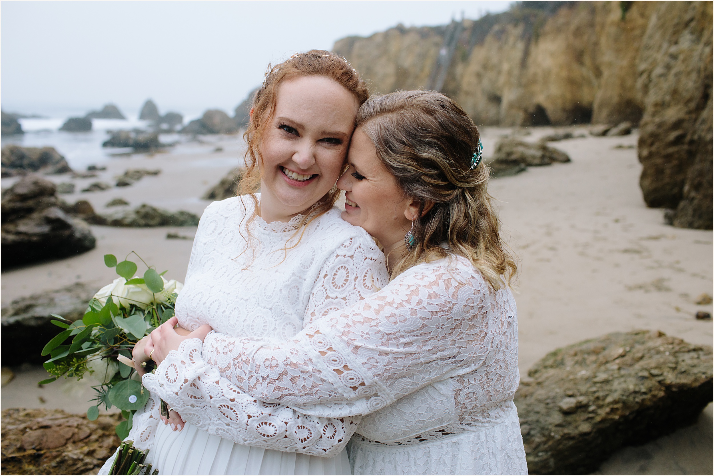 Photo of brides in stunning white lace elopement dresses at El Matador beach