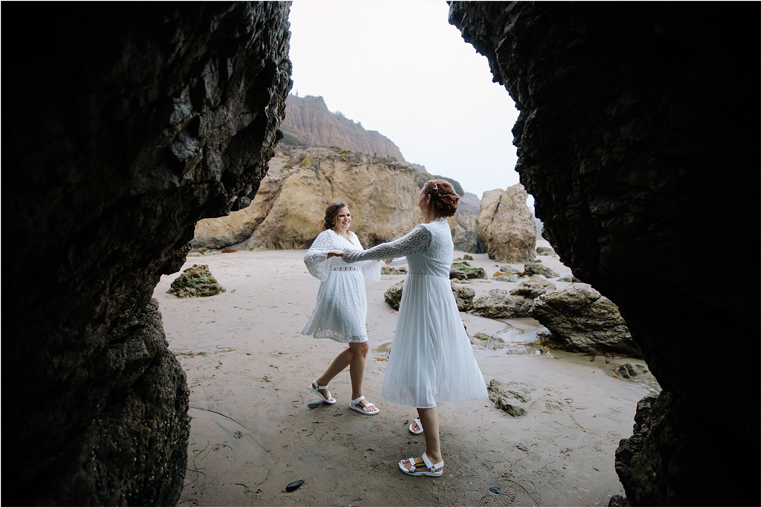 Photo of brides dancing at El Matador beach
