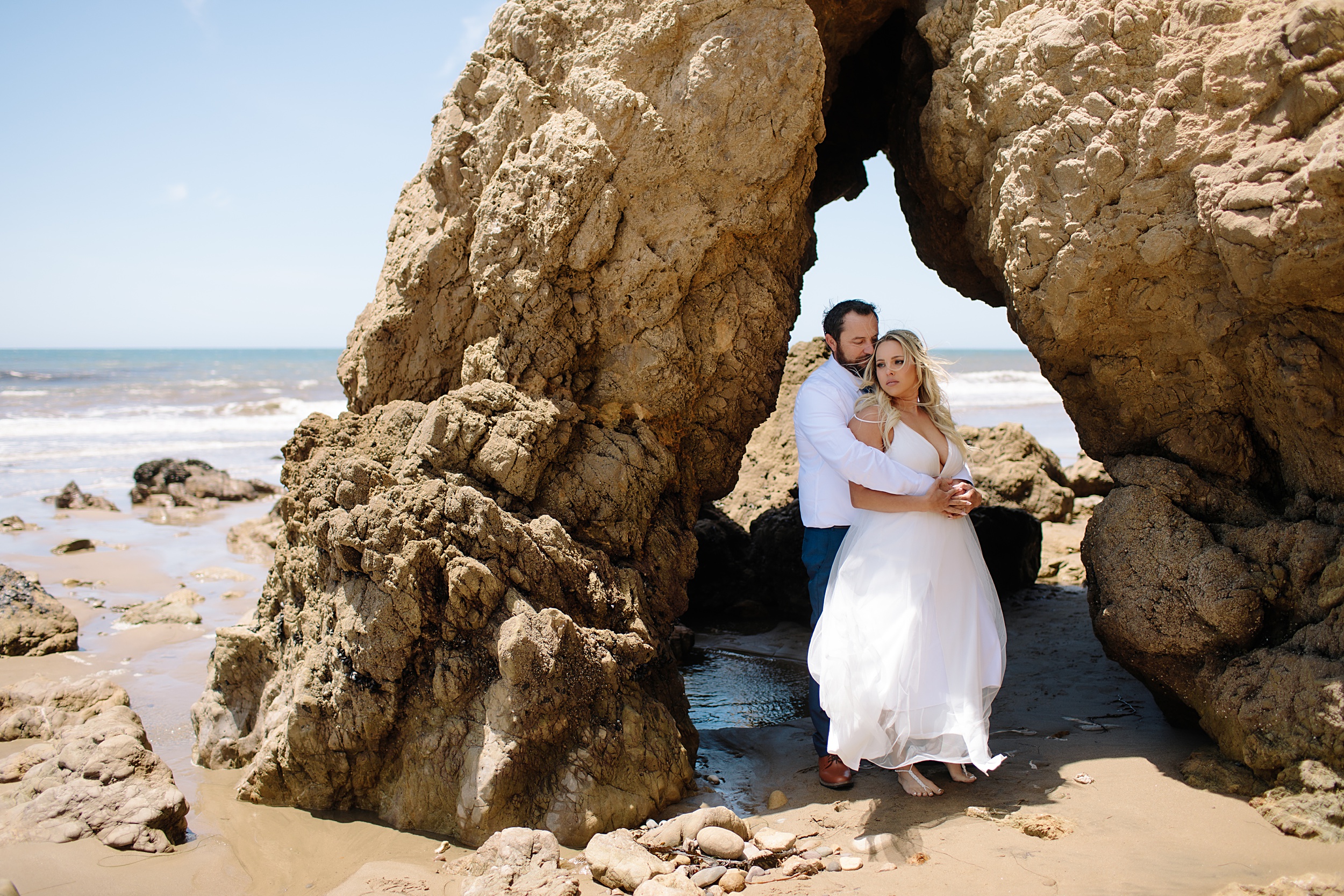 Nicole-and-Russell_0047 Breezy Los Angeles Beach Elopement in Rocky Sea Caves