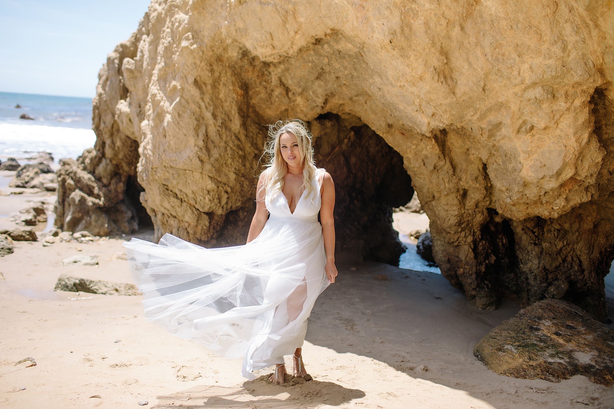 Nicole-and-Russell_0039 Breezy Los Angeles Beach Elopement in Rocky Sea Caves